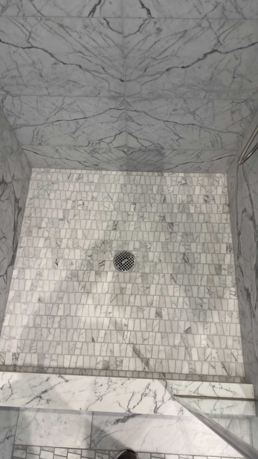 Mosaic shower floor and curb detail